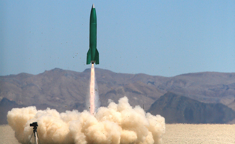 "A photo of a rocket lifting off."